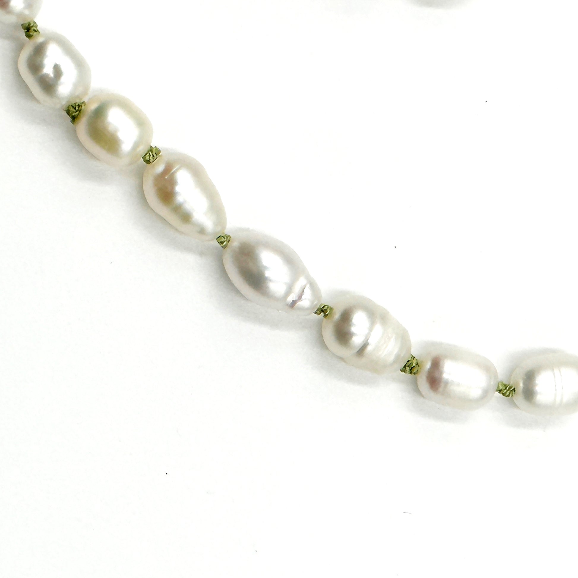 Freshwater pearl necklace. Silk knotted in pistachio green pure silk thread.